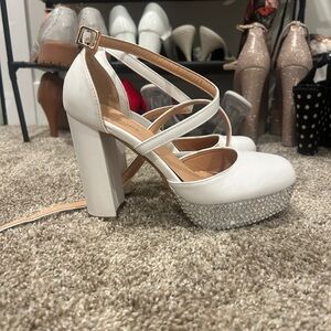 Bedazzled white platform heels